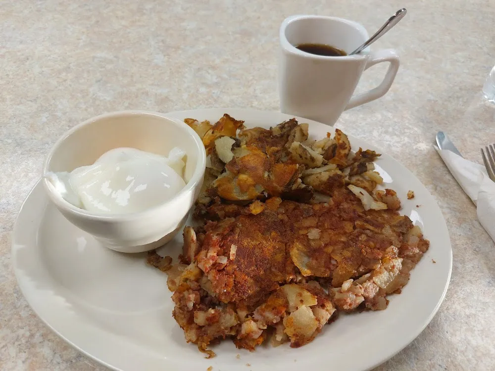 3 Touched Eggs and Corned Beef Hash